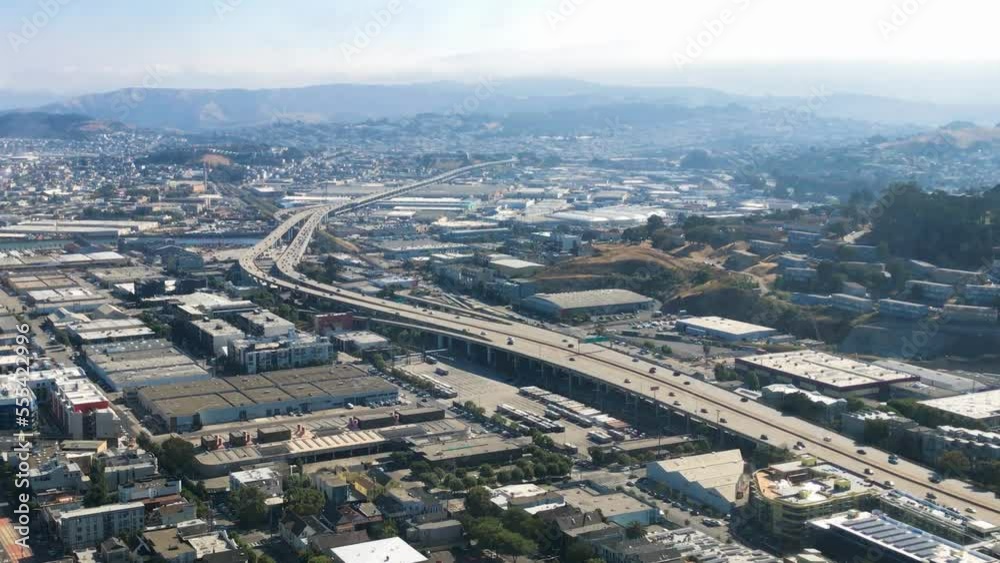 Aerial view of California interstate from helicopter. Approaching city center Aerial view of California interstate from helicopter. Approaching city center