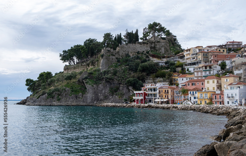 Parga, Greece. Traditional Ionian coast city colorful facade buildings and the Venetian Castle