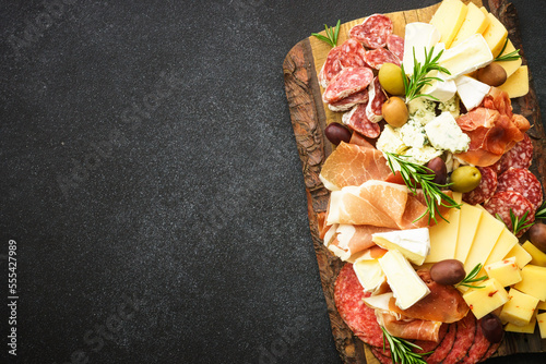 Antipasto platter with jamon, salammi and cheese assortment.