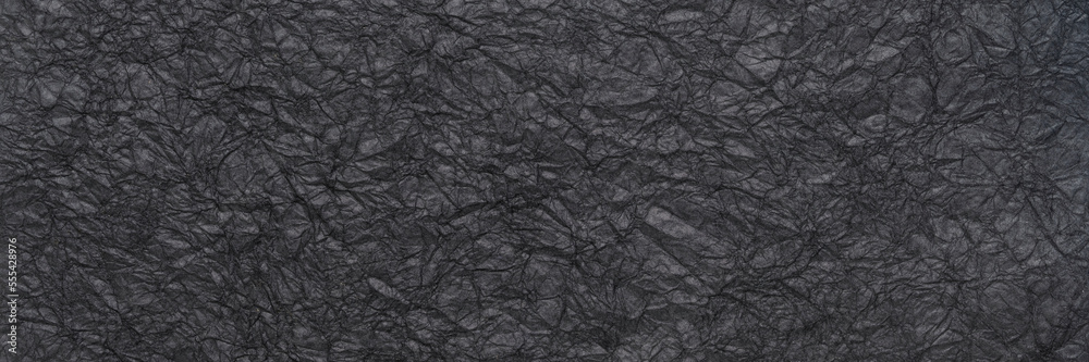 Fototapeta premium background and texture of black wrinkled art paper, panoramic web banner