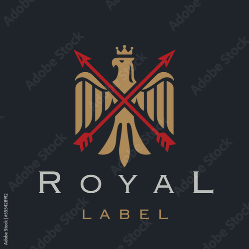 Royal eagle logo design. Luxury falcon heraldry icon. Heraldic bird with crossed arrows and crown brand label. Vector illustration.