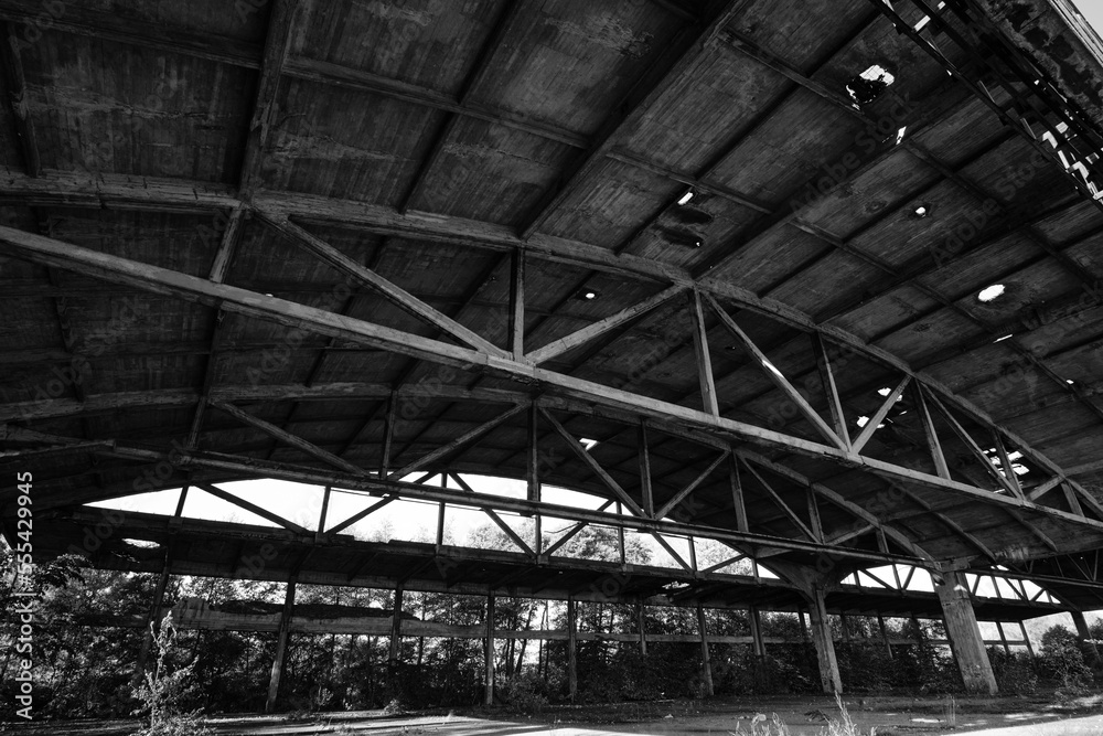 Old arched metal structures abandoned air hangar. Old arched metal structures abandoned air hangar.
