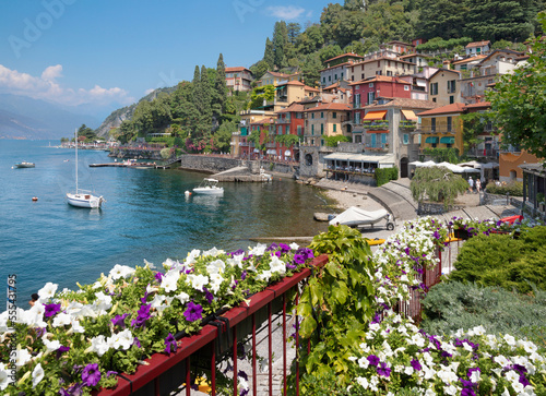 VARENNA, ITALY - JULY 20, 2022: The beach, town and he como lake.