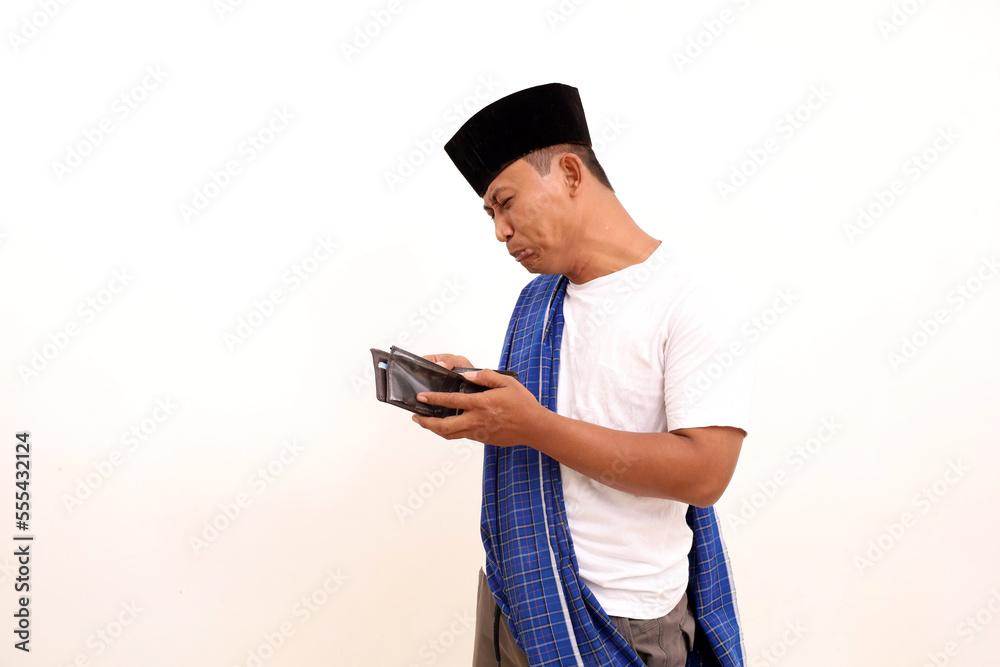 Poor and depressed Asian man wear gray shirt. Isolated on white background. Concept of desperate life. Poor and depressed Asian man wear gray shirt. Isolated on white background. Concept of desperate life.