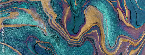 Abstract fluid art background turquoise and golden colors. Liquid marble. Acrylic painting with purple lines photo