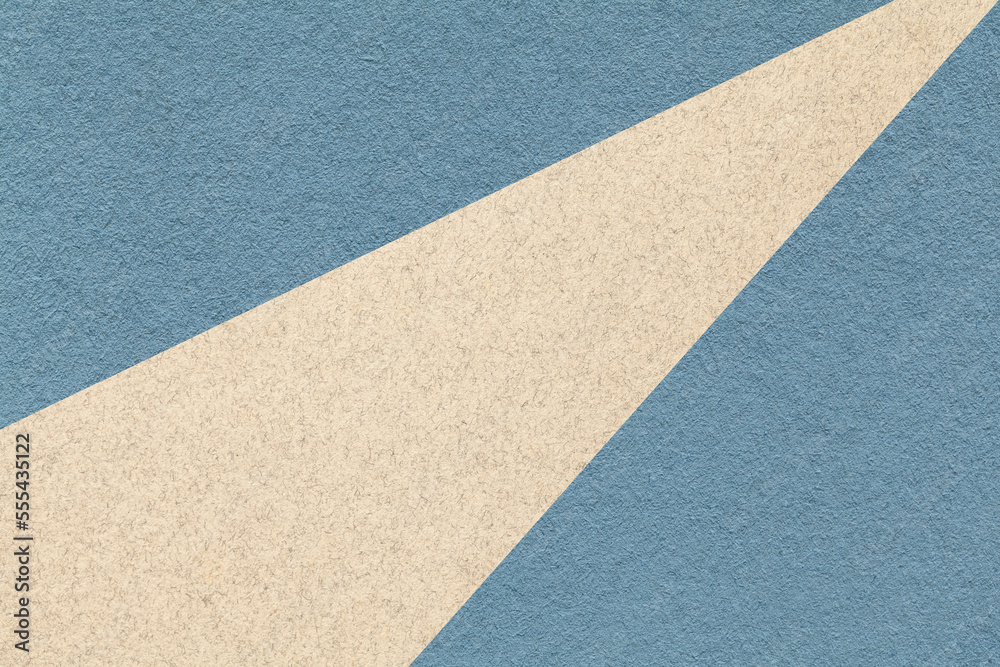 Fototapeta premium Texture of old craft blue color paper background with beige line, macro. Structure of vintage abstract denim cardboard