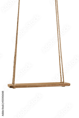 Classic wooden swing on the rope for playing photo