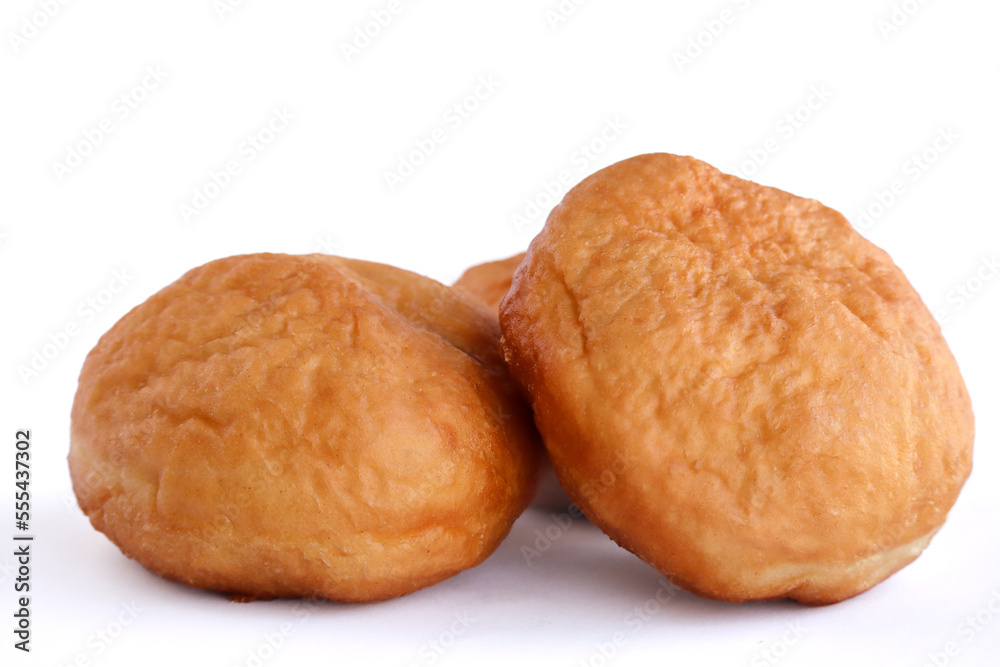 Vetkoek or amagwinya isolated on white background. Traditional South African deep fried dough usually filled with curry or jam 