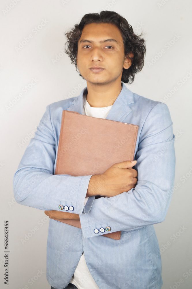 Businessman with folder in front of white background Businessman with folder in front of white background
