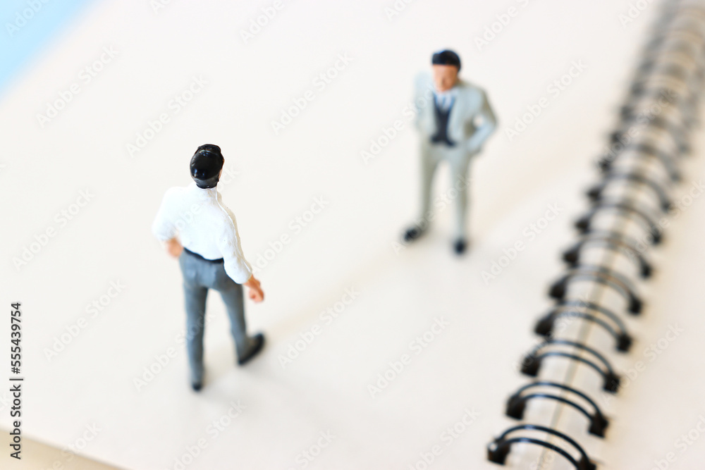 Concept image of people thinking about solving a problem and looking for a right way Concept image of people thinking about solving a problem and looking for a right way