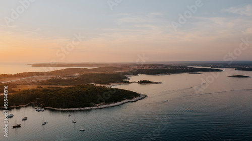 Aerial view of small picturesque village situated on the top southernmost tip of the Istrian peninsula just south of the city of Pula in Croatia. Premantura landscape