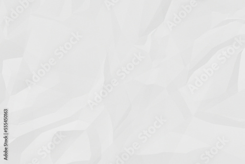 white crumpled paper texture background. A crumpled sheet of white paper abstract background. 