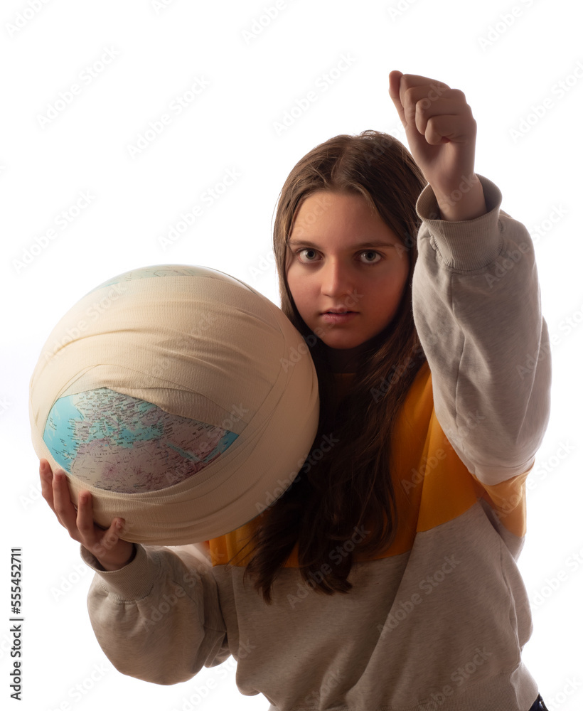 Teenager caucasian girl holding ill planet - Earth globe in bandage . Climate change, enviromental pollution concept. Teenager caucasian girl holding ill planet - Earth globe in bandage . Climate change, enviromental pollution concept.