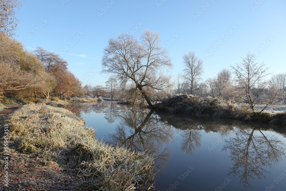 Winter reflections on the River Wey on a cold and frosty day. Winter reflections on the River Wey on a cold and frosty day.