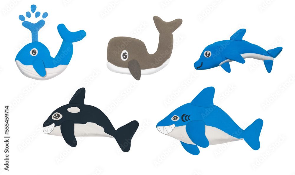 whale and dolphine made from plasticine on white background whale and dolphine made from plasticine on white background