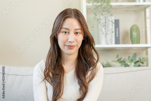 Smiling positive, attractive asian young woman wearing casual dress, portrait of beautiful brunette her with long brown hair, feeling happy looking to camera standing isolated on white background. Free Download Smiling positive, attractive asian young woman wearing casual dress, portrait of beautiful brunette her with long brown hair, feeling happy looking to camera standing isolated on white background. - GFXLoad
