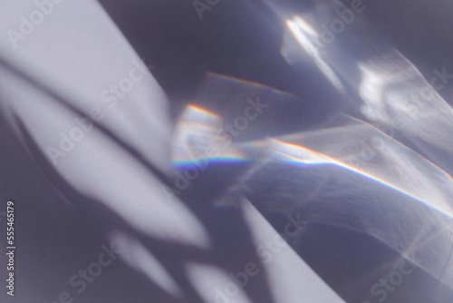 Tableau sur toile Sunlight background, abstract backdrop with light and shadow, glare and shine on paper texture, rainbow sun flare, blue violet color aesthetic image