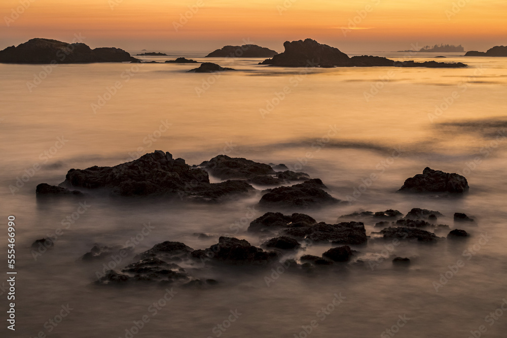 Dusk falls over rocky islets in Nuchatlitz Provincial Park; British Columbia, Canada Dusk falls over rocky islets in Nuchatlitz Provincial Park; British Columbia, Canada