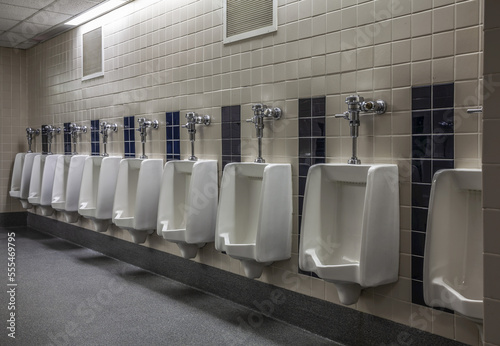 Urinals in a gymnasium bathroom; Connecticut, United States of America photo