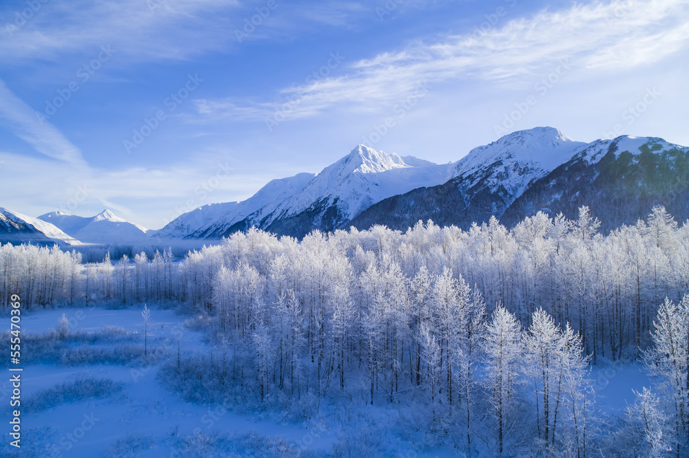 Winter scenic of mountains peaks and valley in Alaska, Portage Valley in South-central Alaska; Anchorage, Alaska, United States of America Winter scenic of mountains peaks and valley in Alaska, Portage Valley in South-central Alaska; Anchorage, Alaska, United States of America