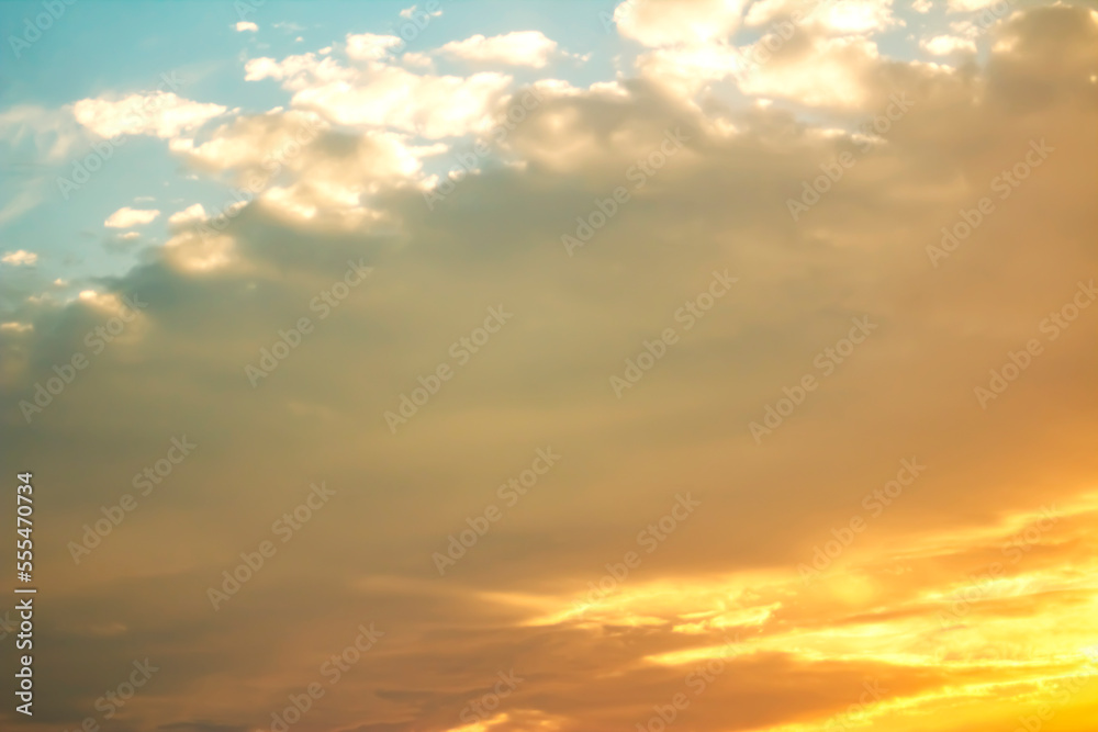 Illuminated sunset sky with clouds