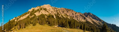 High resolution stitched sunset panorama at the famous Wiedhag-Alpe, Bad Hindelang, Allgaeu, Bavaria, Germany