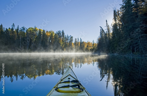 Kayaking at Glad Lake, Duck Mountain Provincial Park; Manitoba, Canada photo