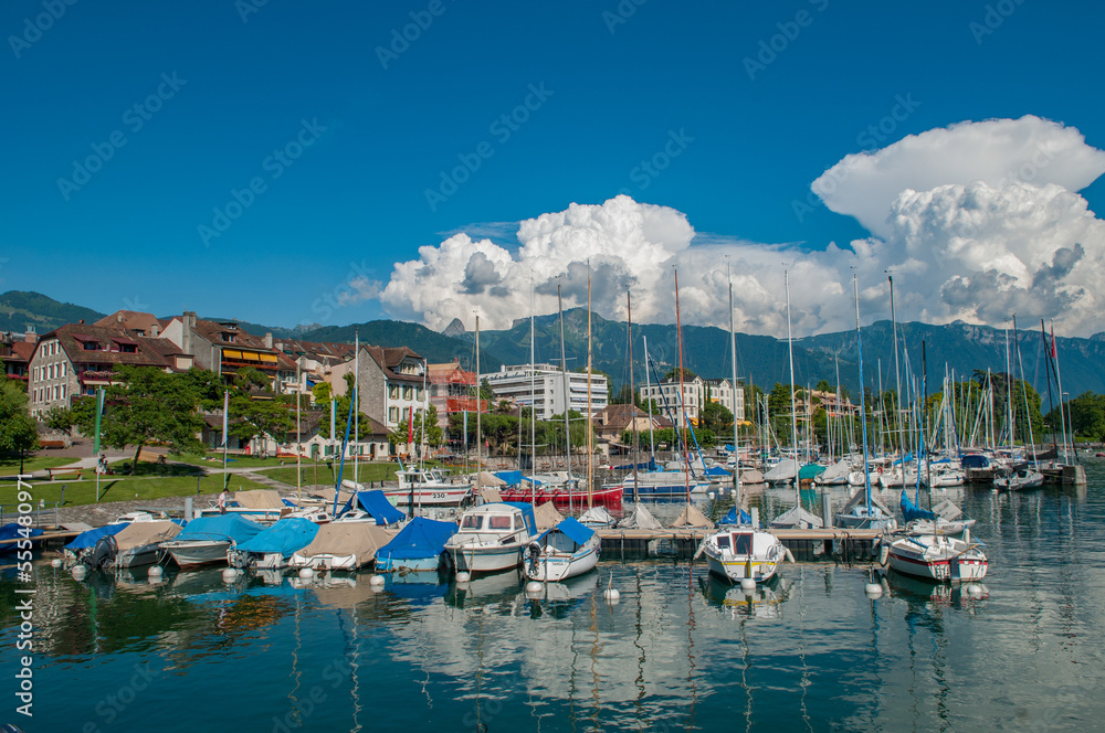 Marina in Vevey, Switzerland filled with sailboats.