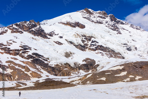 Mount Silvertip towers over Castner Glacier in the Alaska Range; Alaska, United States of America photo