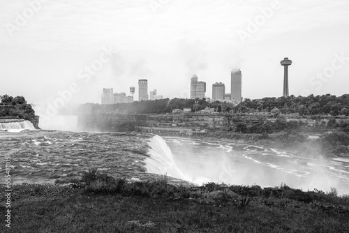 Niagara Falls Summer Travel Landscape Series, view of Canadian Side Skyline from America Falls in New York, USA, monochromatic retro-style photography