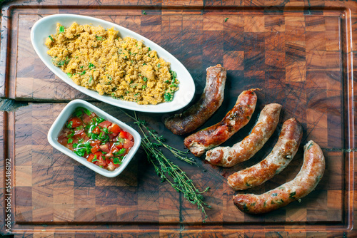 Canvastavla Pork sausage with farofa and vinaigrette
