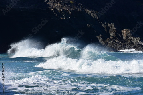 The blue of the  sea and the waves meet the horizon