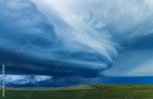 Dramatic dark storm clouds over farmland; Guymon, Oklahoma, United States of America photo