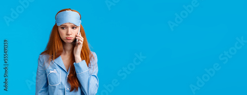 Fotografia, Obraz Sulky and gloomy upset cute silly redhead girl calling girlfriend talking about