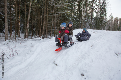 Sledding on a winter day.