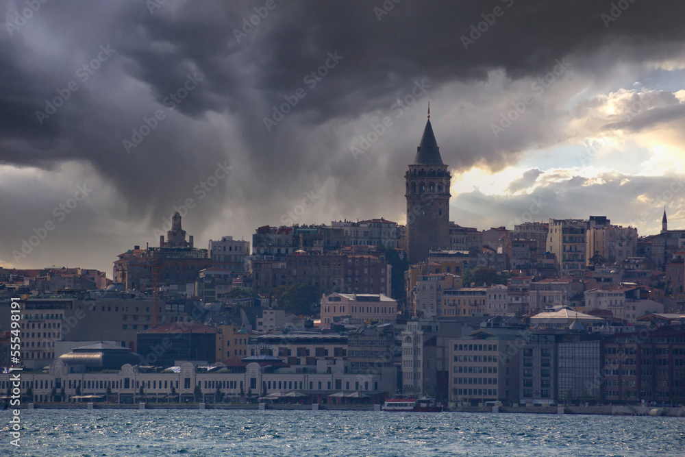 Fototapeta premium View of Galata Tower of Istanbul in Turkey. Sky and cloud background. View of Istanbul. Turkish name: Galata Kulesi. August, 2022.
