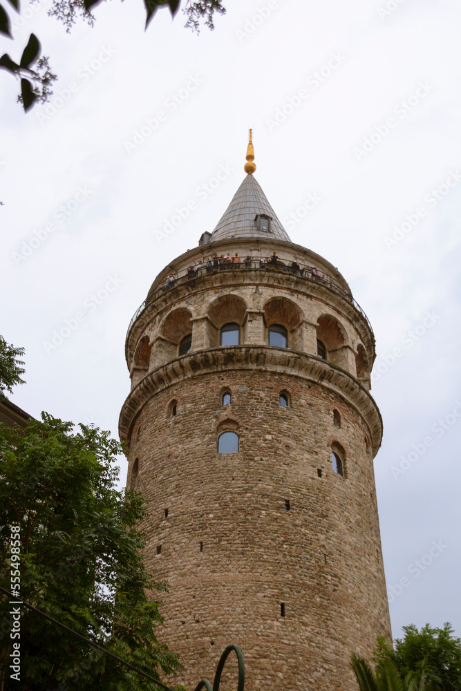View of Galata Tower of Istanbul in Turkey. Sky and cloud background. View of Istanbul. Turkish name: Galata Kulesi. August, 2022.
