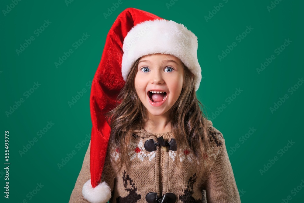 Cute small child in Christmas hat