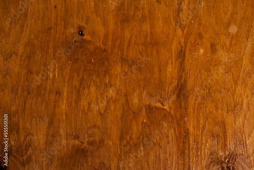 Vintage brown wood background texture with knots and nail holes. Old painted wood wall. Brown abstract background. Vintage wooden dark horizontal boards.