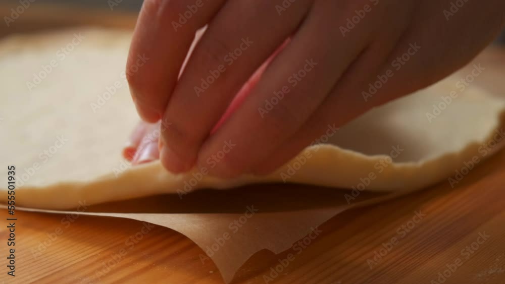 chef makes pizza. traditional Italian pizza margarita. the chef distributes the pizza base from tomatoes, basil, garlic, onion and cheese on the dough chef makes pizza. traditional Italian pizza margarita. the chef distributes the pizza base from tomatoes, basil, garlic, onion and cheese on the dough