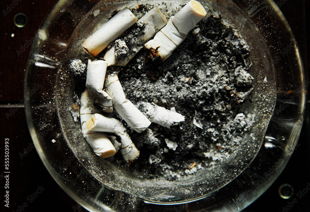 Close-Up of Ashtray with Cigarette Butts Close-Up of Ashtray with Cigarette Butts