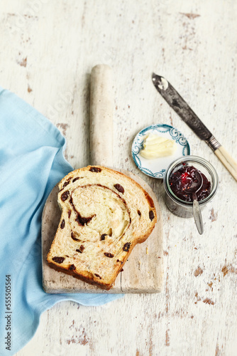 Overhead View of Slice Of Cinnamon Rasin Bread with Butter and Jam, Studio Shot photo