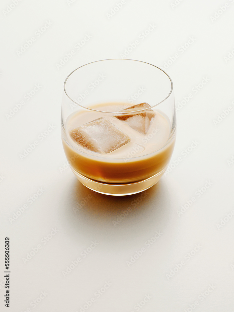 Glass of Cream Liqueur with Ice, Studio Shot Glass of Cream Liqueur with Ice, Studio Shot