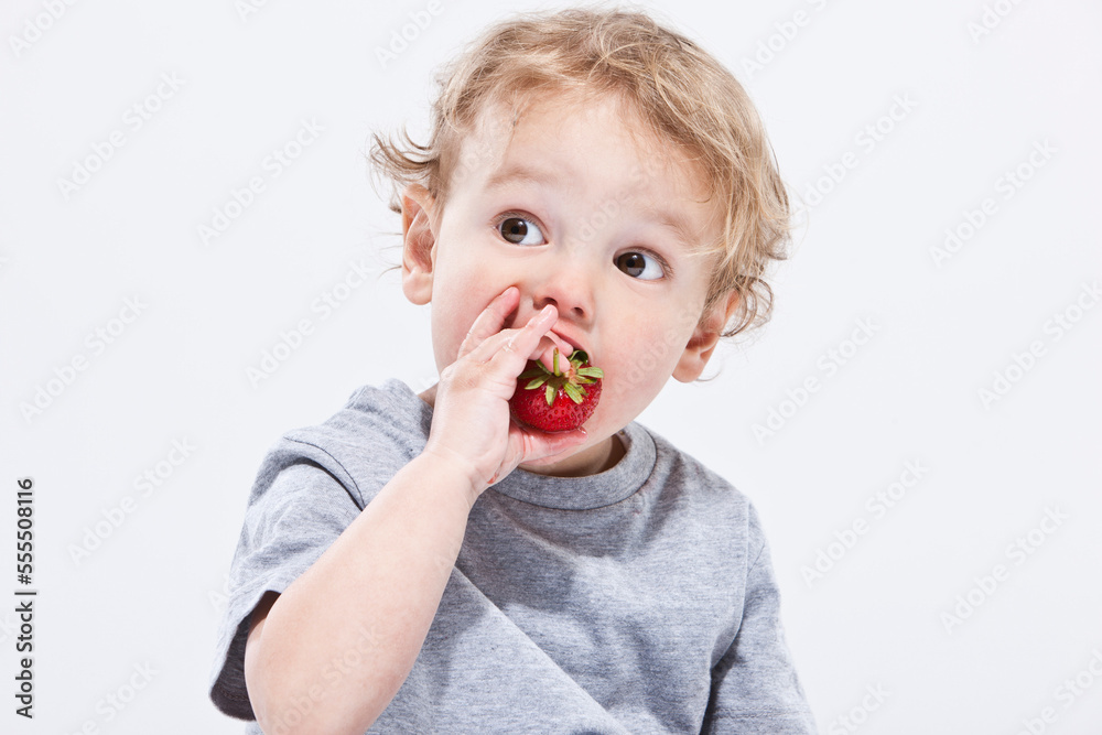Boy Eating Strawberry Boy Eating Strawberry