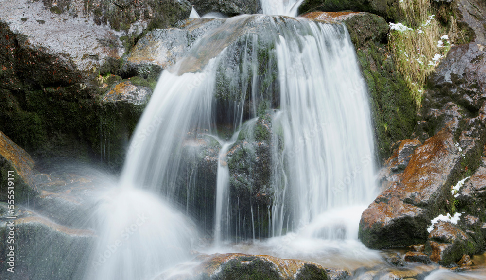 Waterfalls in a forest in spring, Bodenmais, Regen District, Bavarian Forest National Park, Bavaria, Germany Waterfalls in a forest in spring, Bodenmais, Regen District, Bavarian Forest National Park, Bavaria, Germany