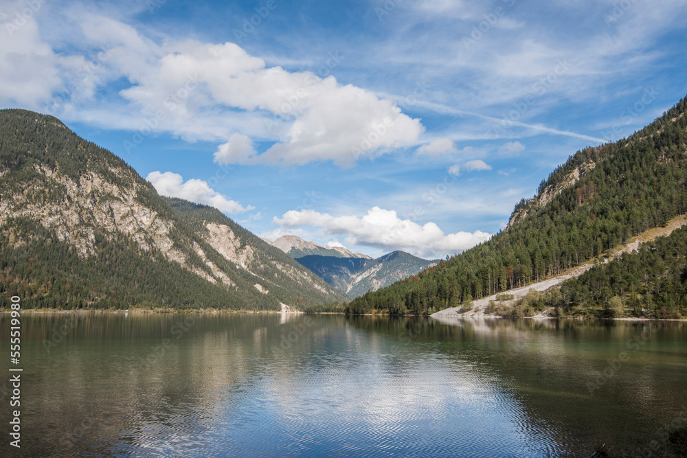 Landscape of a clear lake in autumn, Plansee, Tirol, Austria Landscape of a clear lake in autumn, Plansee, Tirol, Austria