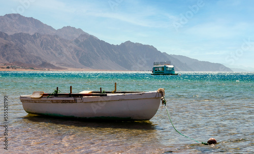 old wooden fishing boat near the coast of the red sea in egypt