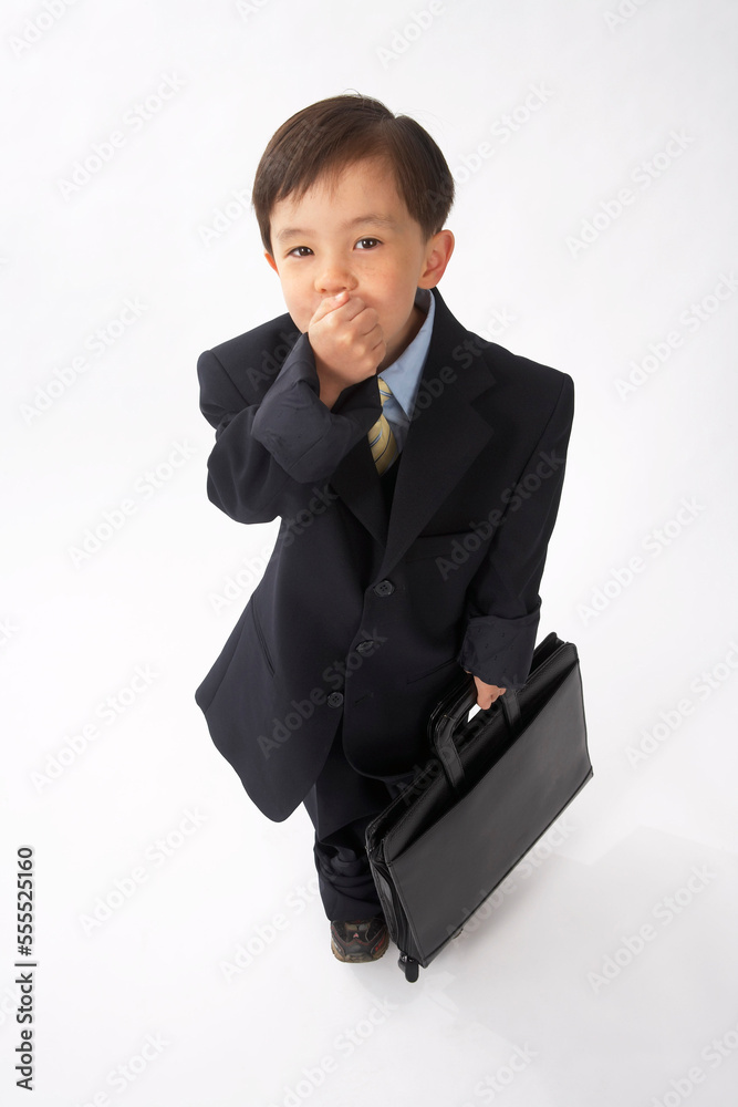 Little Boy Dressed Up as a Businessman