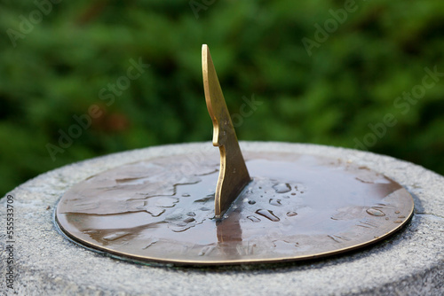 Close-up of Raindrops on Sundial, Parliament Hill, Ottawa, Ontario, Canada photo