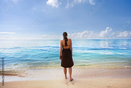 Woman on Beach, Cozumel, Mexico photo